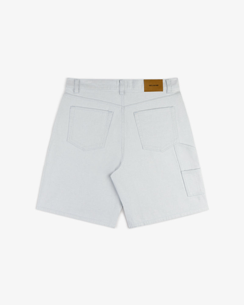 Back view of Light Wash Denim Short with two large back pockets and a brown patch label on the waistband.