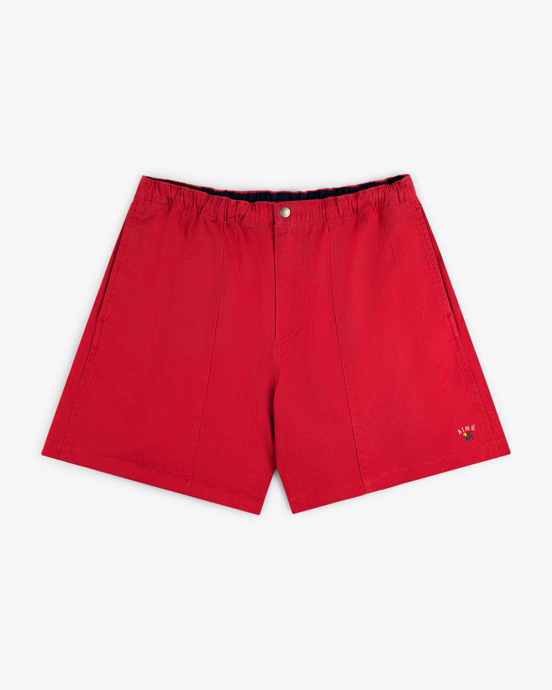 Crest Casual Short: Bright red, elastic waistband, button closure, with a small embroidered bee on the front left leg.