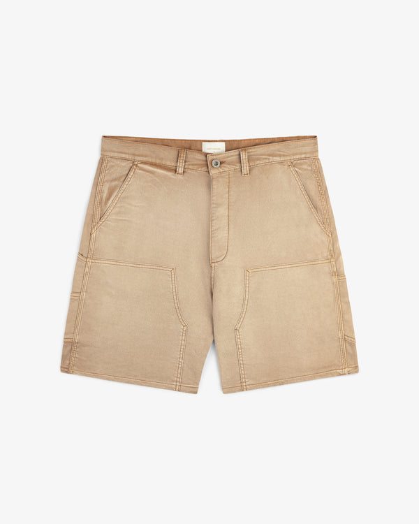 Garment Dyed Carpenter Short in beige with front patch pockets, button closure, and belt loops on white background.
