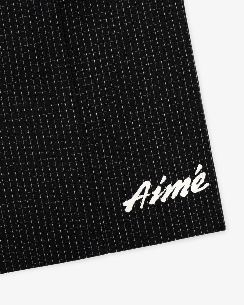 Black Ripstop Nylon Wave Short with a subtle grid and white embroidered Aimé in the bottom right corner.