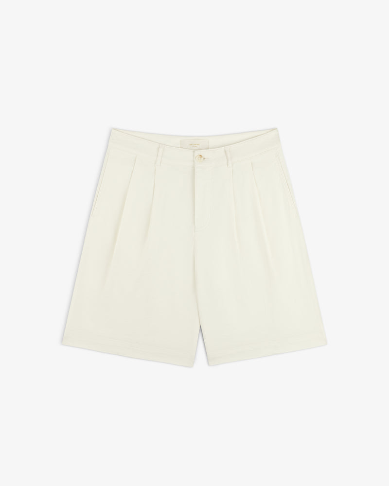 Pleated Linen Blend Bermuda Short in cream with side pockets, front button, and zipper closure on a white background.