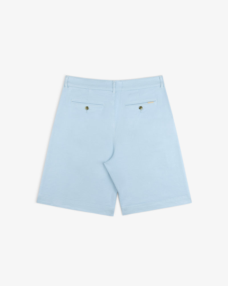 Pleated Linen Blend Bermuda Short in light blue, shown from the back with buttoned rear pockets and a tag above the right.