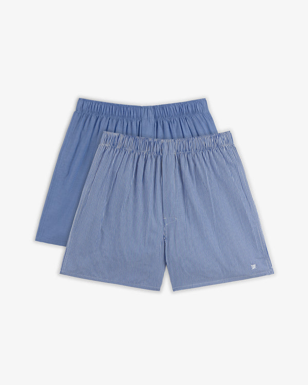 Boxer Short 2-Pack: one solid blue pair and one blue with white pinstripes, laid flat on a white background.