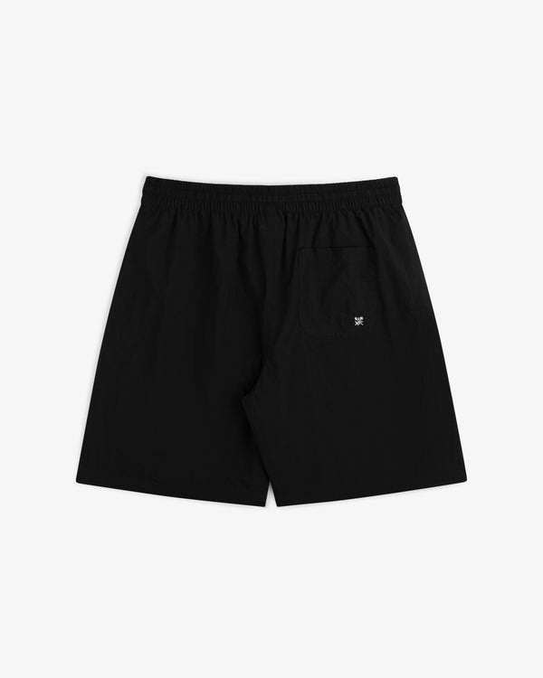 Long Nylon Track Short in black, shown from the back with elastic waistband and single back pocket on a white background.