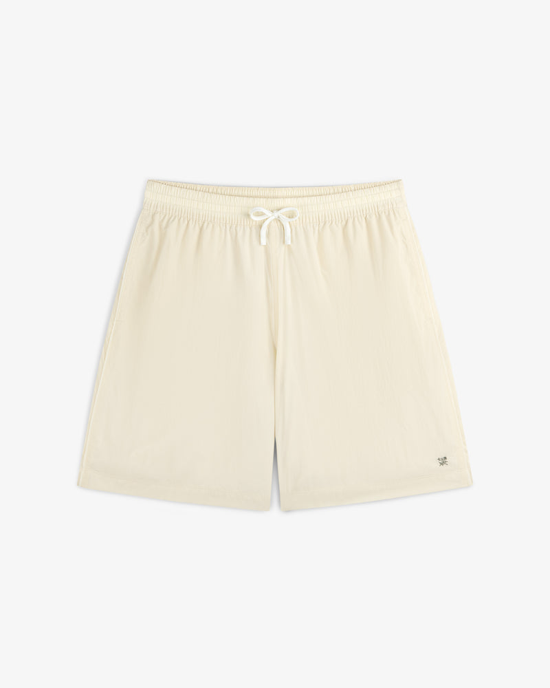 Long Nylon Track Short in off-white with drawstring and elastic waistband, shown flat on a white background.