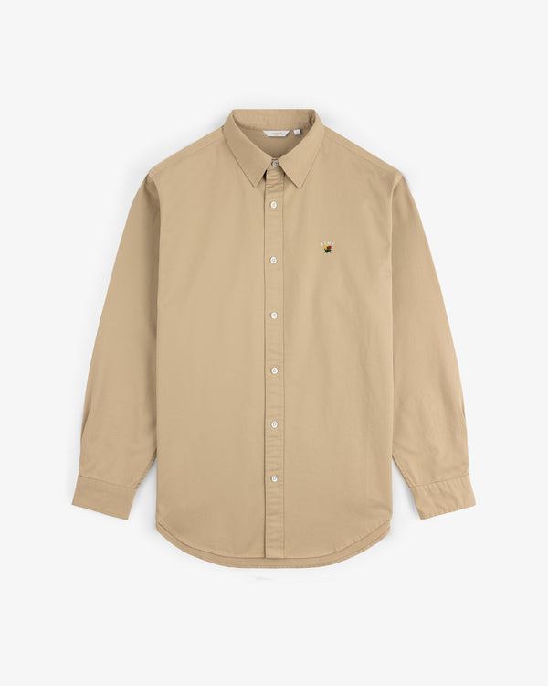 Leon Overshirt in beige, long-sleeve with button-up front and small embroidered bee on left chest, shown on white background.