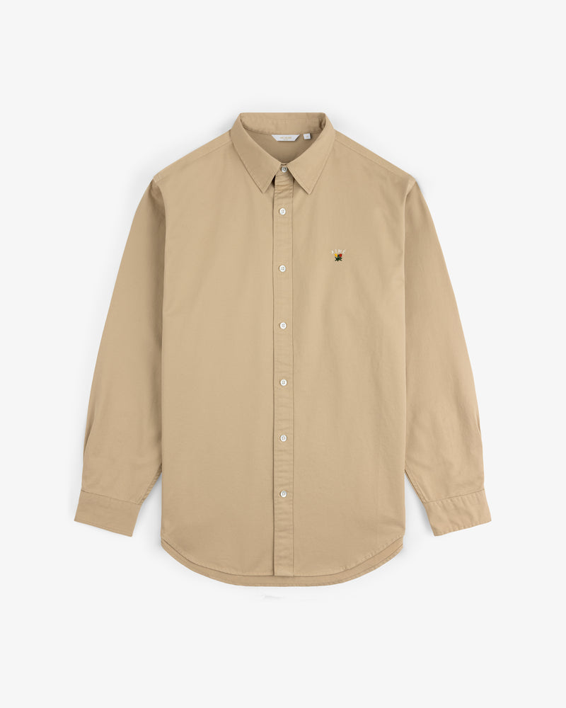 Leon Overshirt in beige, long-sleeve with button-up front and small embroidered bee on left chest, shown on white background.