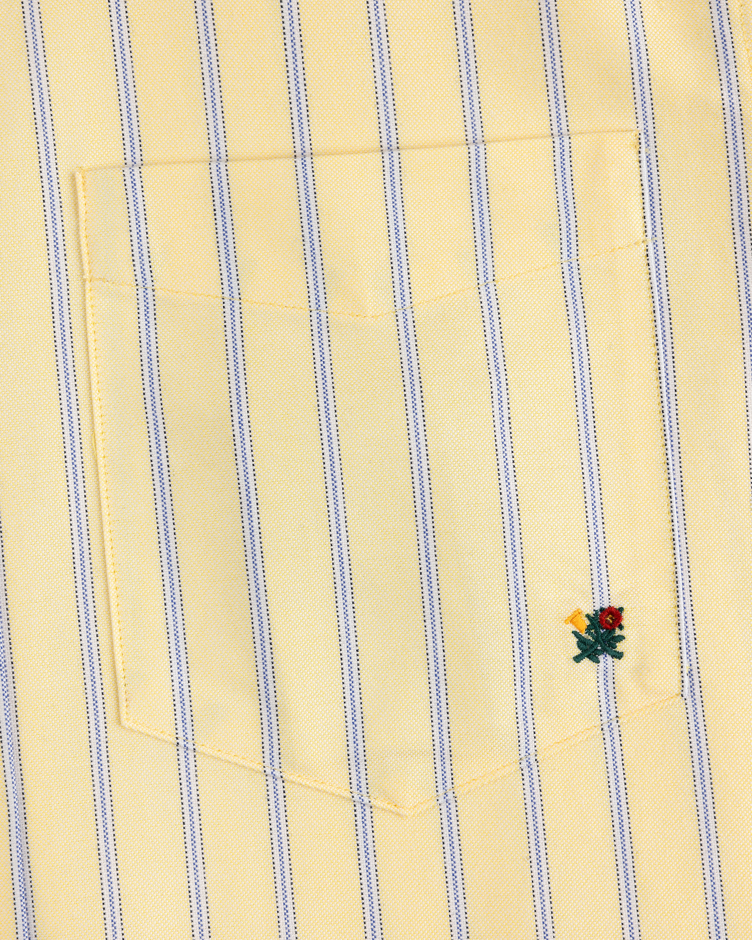 Yarn Dyed Striped Crest Shirt: yellow with blue stripes, pocket, and a small red-yellow embroidered flower at the bottom right.