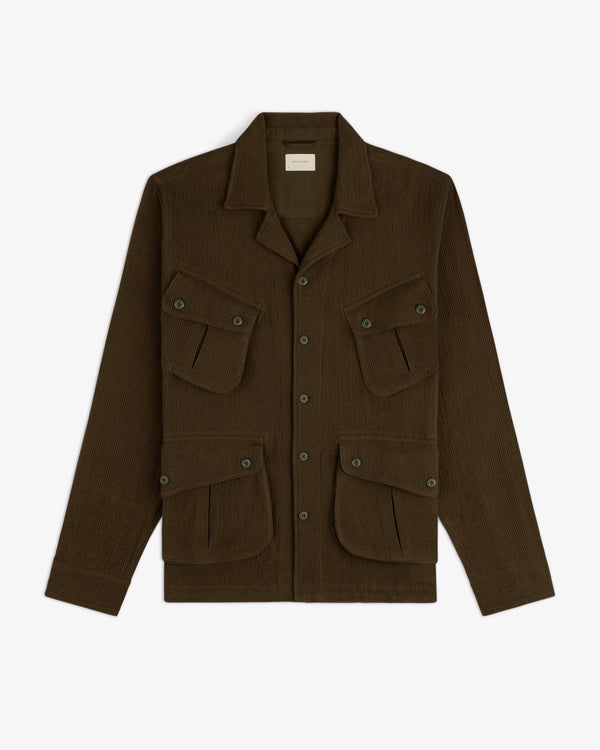 Mesh Jungle Shirt with a collar and four front buttoned flap pockets, laid flat on a white background.