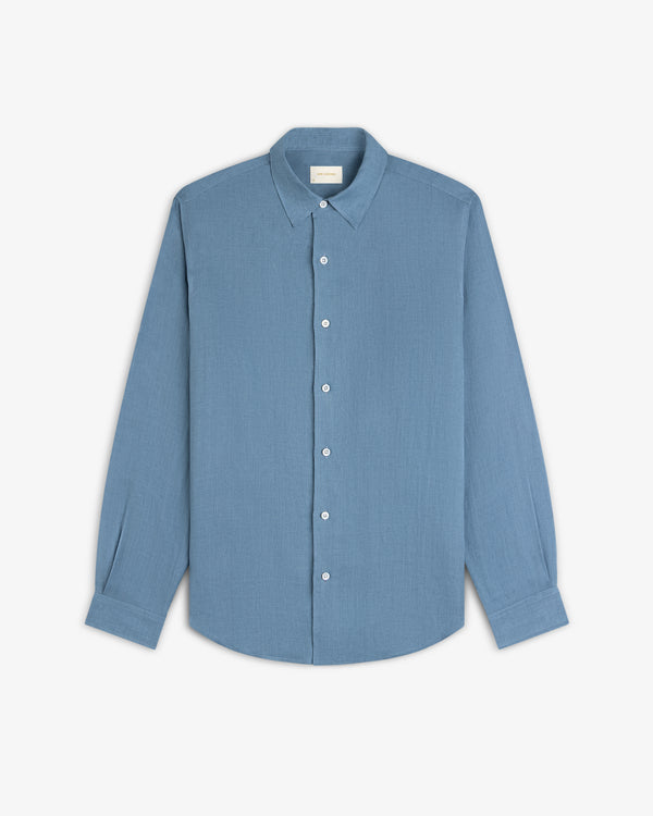 Long-Sleeve Linen Shirt in light blue with a collar and buttons, shown on a white background.
