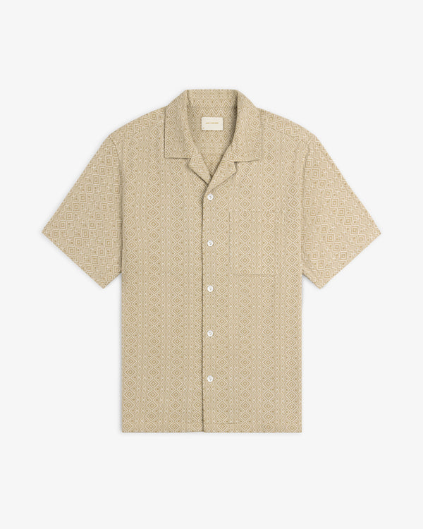 Jacquard Leisure Shirt in beige with short sleeves and subtle geometric diamond pattern, shown on a white background.