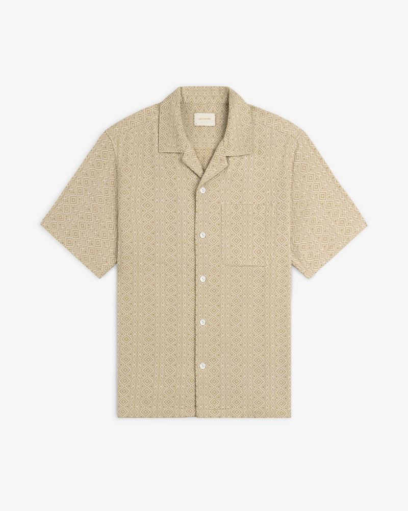 Jacquard Leisure Shirt in beige with short sleeves and subtle geometric diamond pattern, shown on a white background.