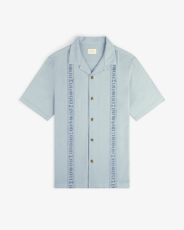 Light blue Linen Blend Leisure Shirt with short sleeves, camp collar, and vertical front embroidery.