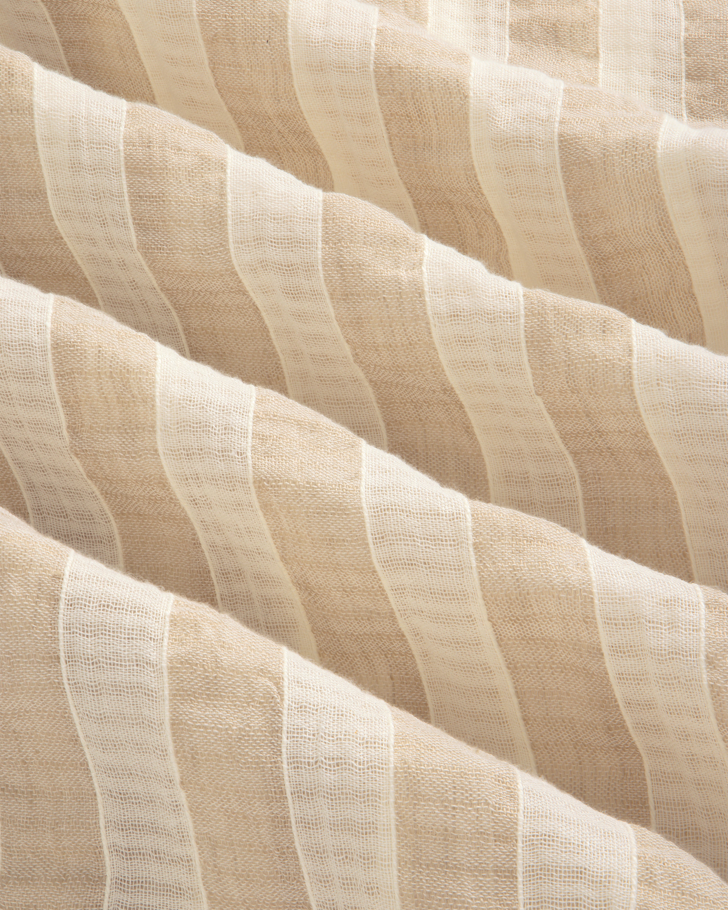 Close-up of the Linen Blend Striped Camp Shirt's beige and white, semi-sheer, wavy-textured fabric.