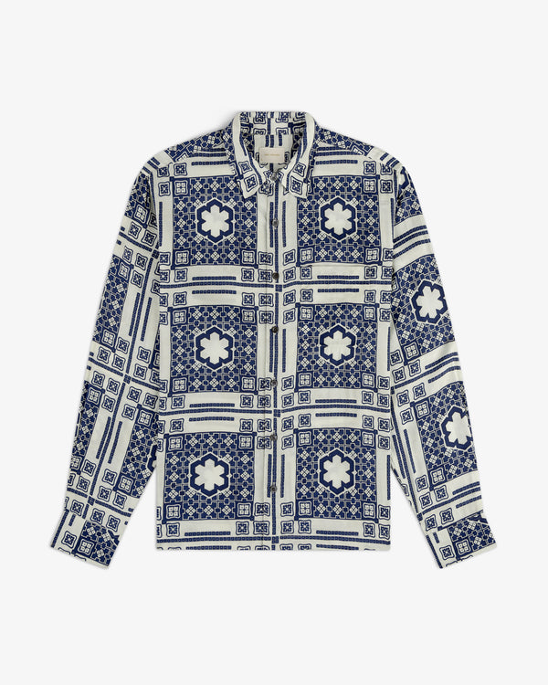 Mosaic Button Down Shirt with blue and white geometric and floral tile pattern, long sleeves, and button-up front.