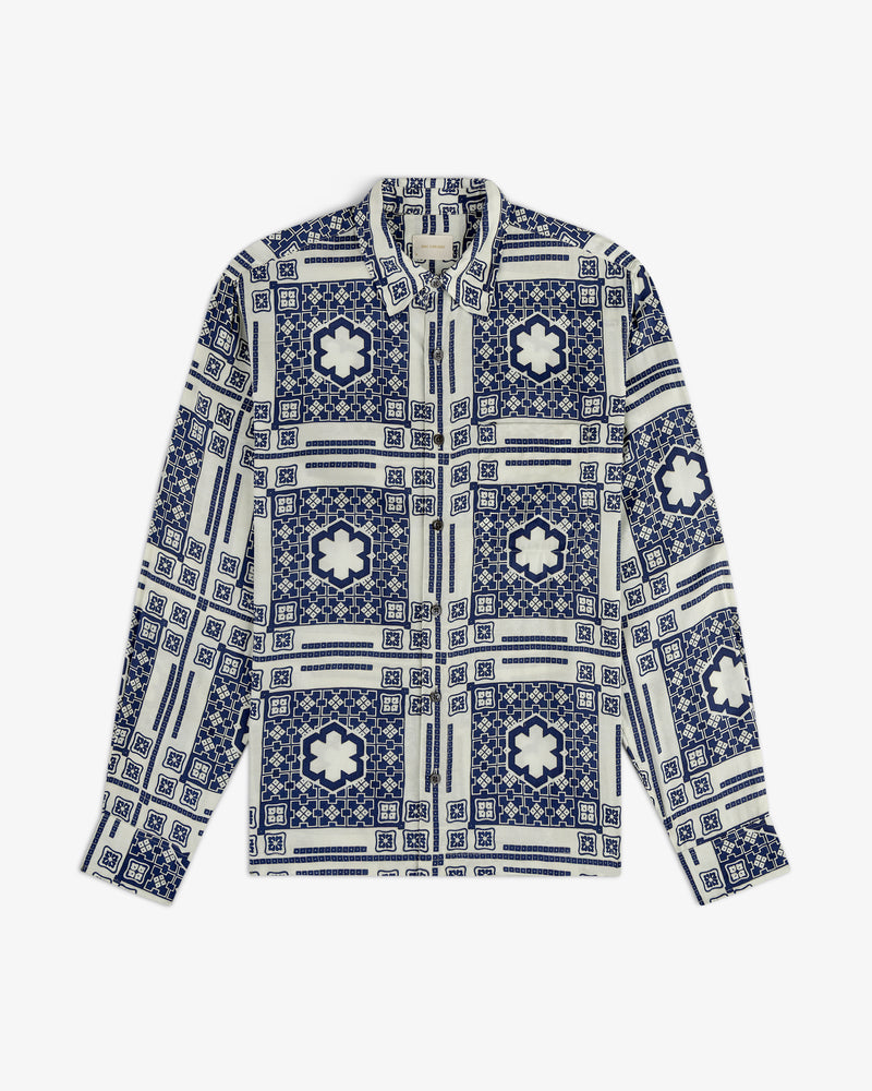 Mosaic Button Down Shirt with blue and white geometric and floral tile pattern, long sleeves, and button-up front.