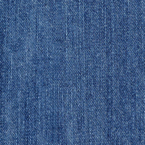 Close-up of the Crest Chambray Shirt, highlighting its blue denim fabric's detailed weave and textured surface.