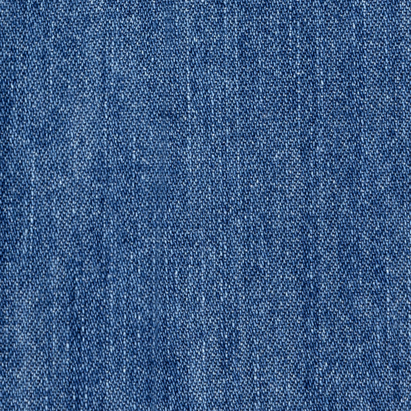 Close-up of the Crest Chambray Shirt, highlighting its blue denim fabric's detailed weave and textured surface.