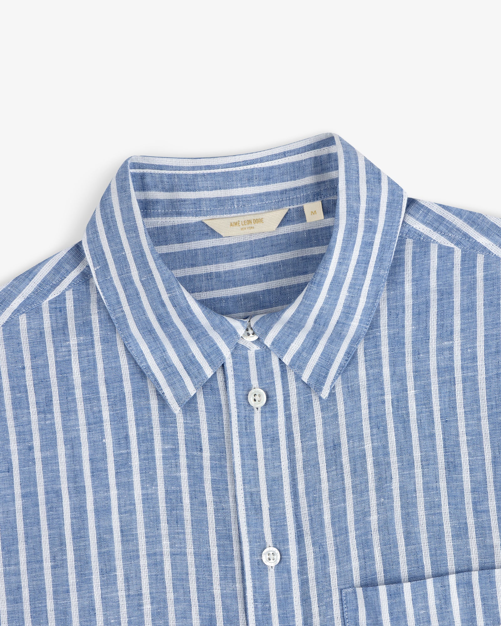 Striped Linen Casual Shirt in blue and white, button-down with collar and chest pocket, shown from the shoulders up.