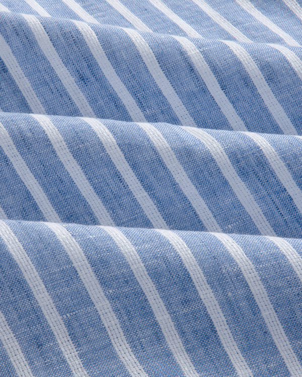 The Striped Linen Casual Shirt features blue and white stripes with soft waves and a textured look.