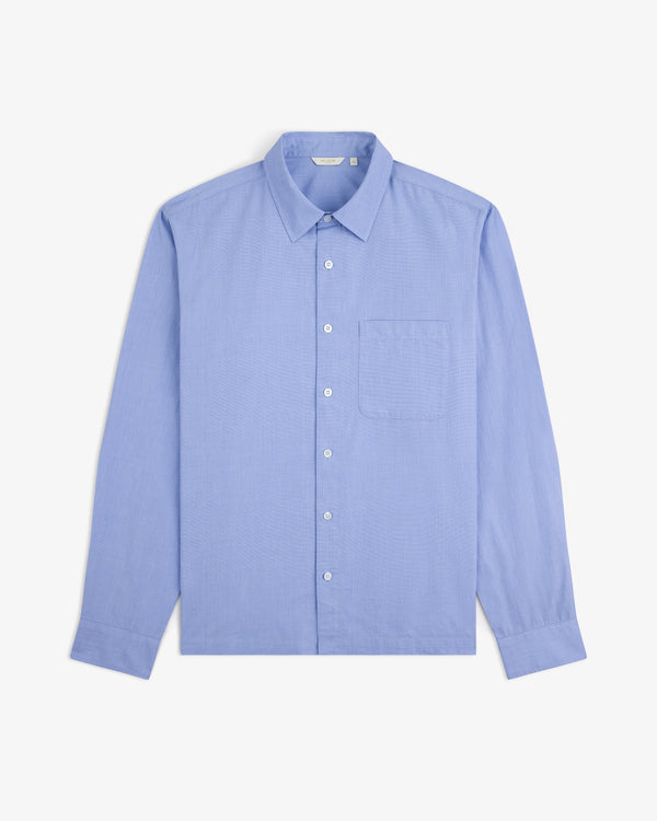 Light blue Poplin Casual Shirt with long sleeves, collar, and chest pocket, laid flat on a white background.