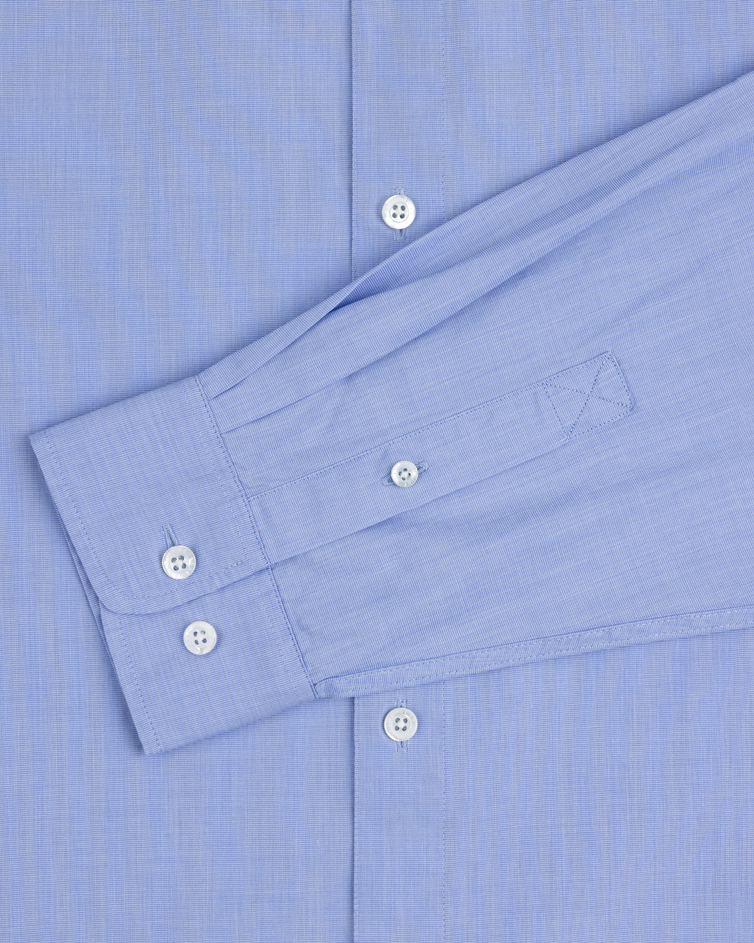 Poplin Casual Shirt in light blue with white buttons, shown from the front and featuring a buttoned long sleeve cuff.