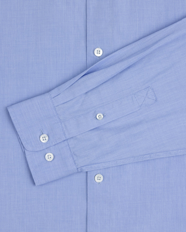 Poplin Casual Shirt in light blue with white buttons, shown from the front and featuring a buttoned long sleeve cuff.