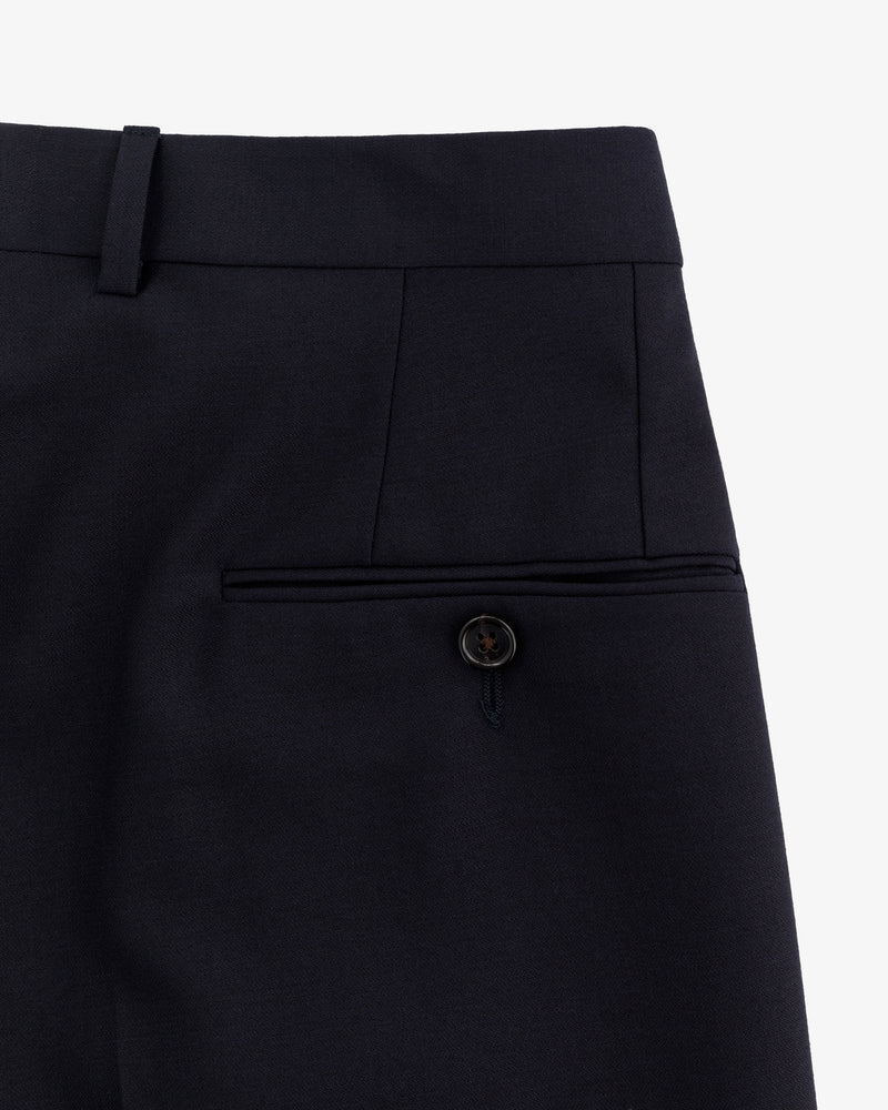 Close-up of Tropical Wool Suit Trouser showing waistband, belt loop, and back pocket with button closure.