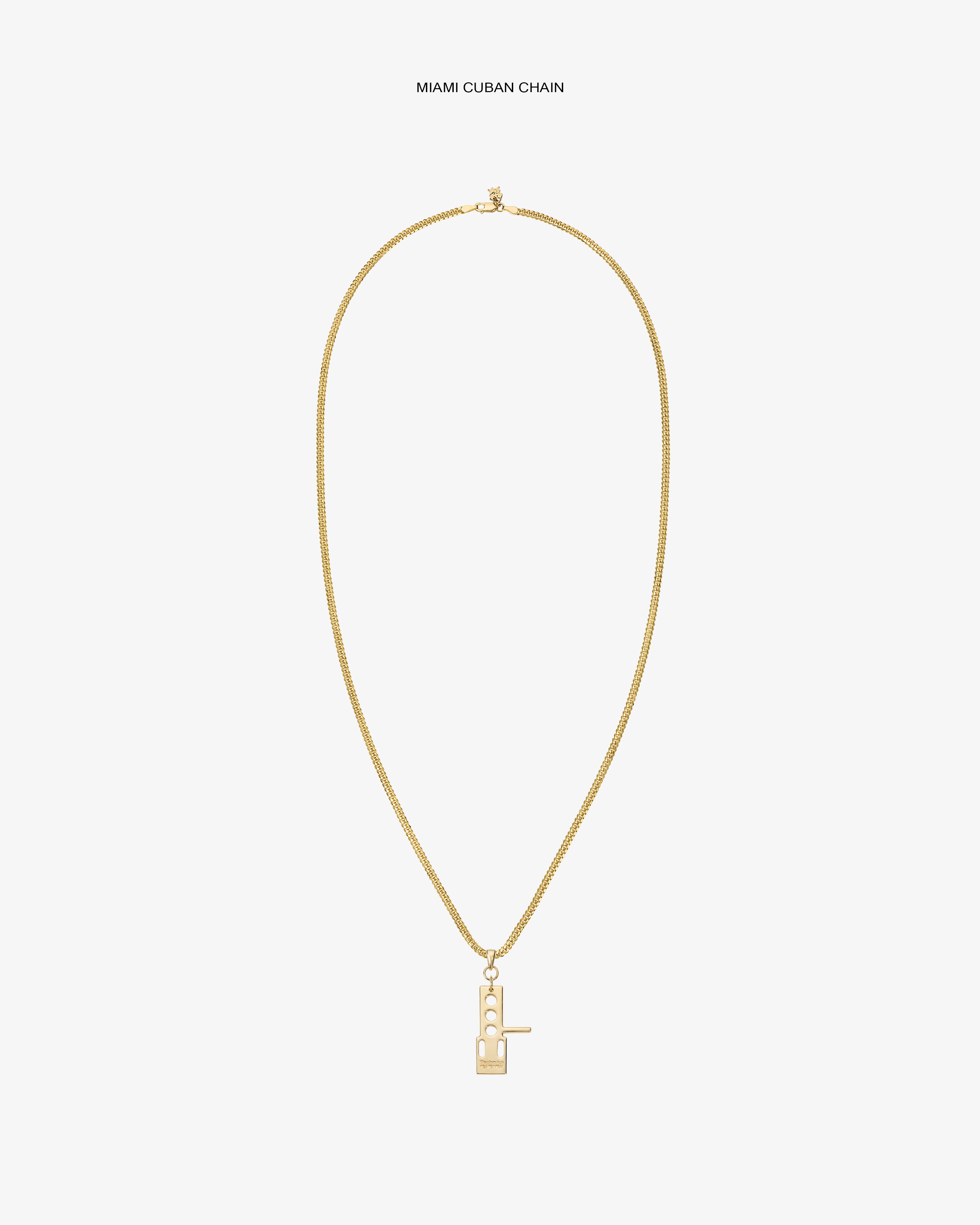 ALD / Technics 14Kt Gold Pendant necklace with a rectangular charm, shown on a plain white background.