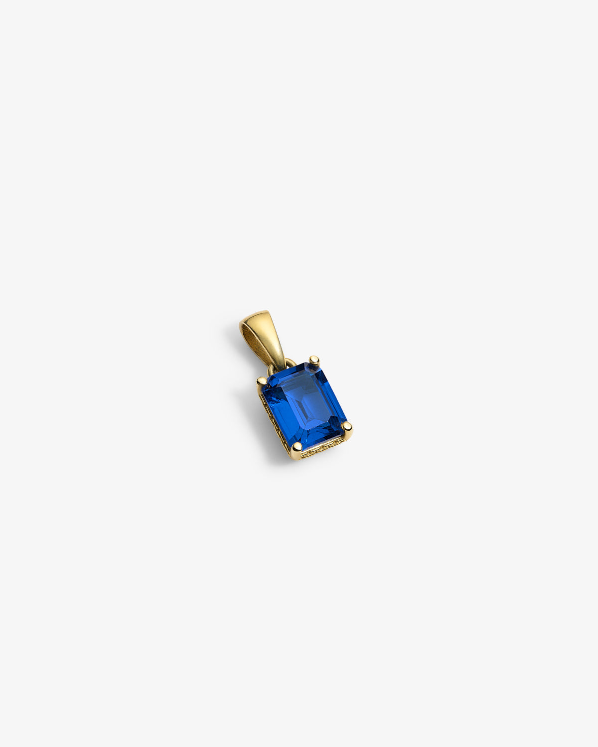 14Kt Gold Gemstone Pendant featuring a rectangular blue stone, displayed on a white background.