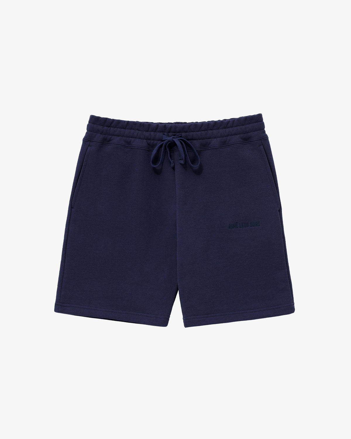 Tonal Logo Sweatshorts in navy with side pockets, elastic waist, and subtle embroidered logo on the left thigh.