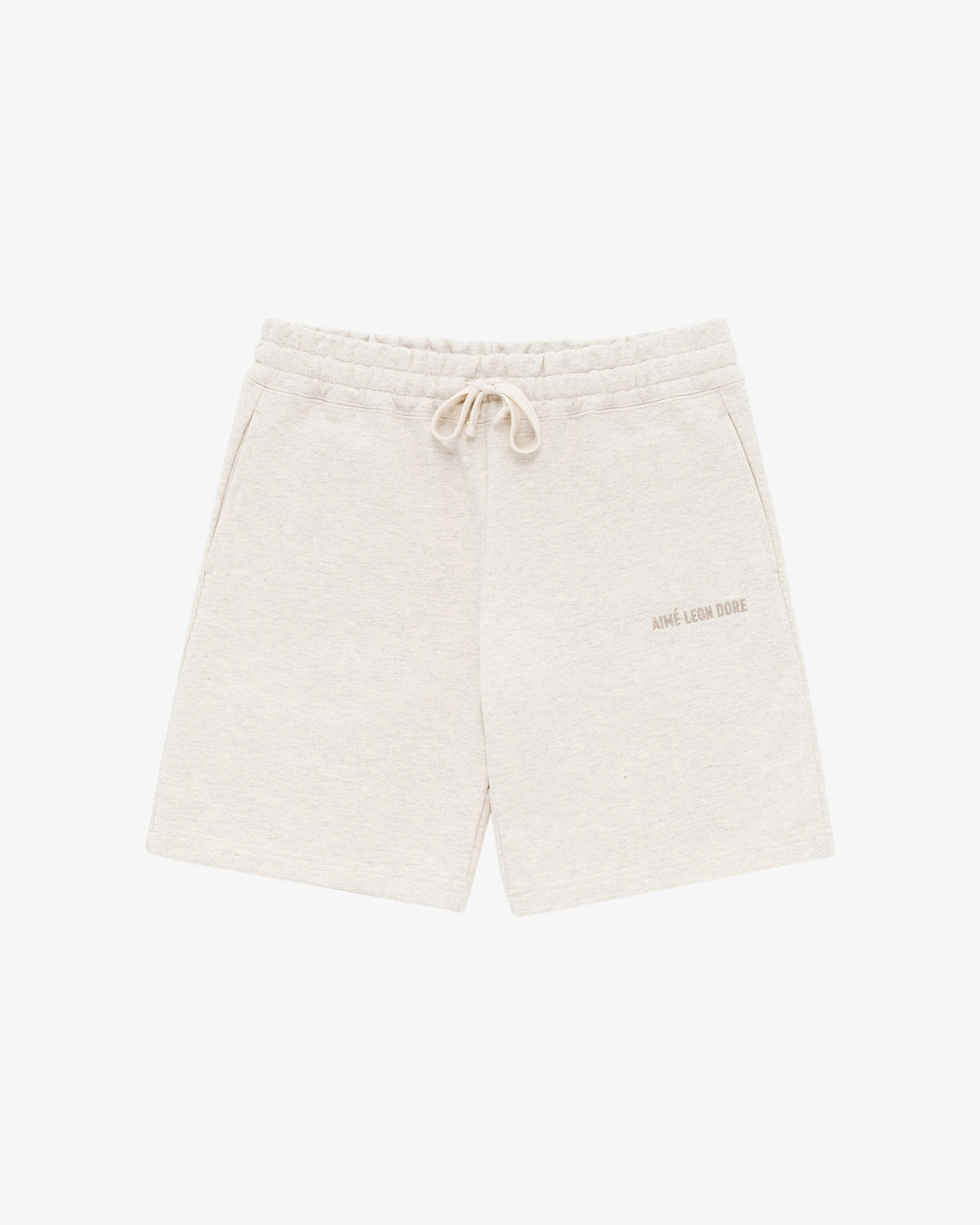 Tonal Logo Sweatshorts in beige with side pockets and Aimé Leon Dore logo on the left leg, shown on white background.