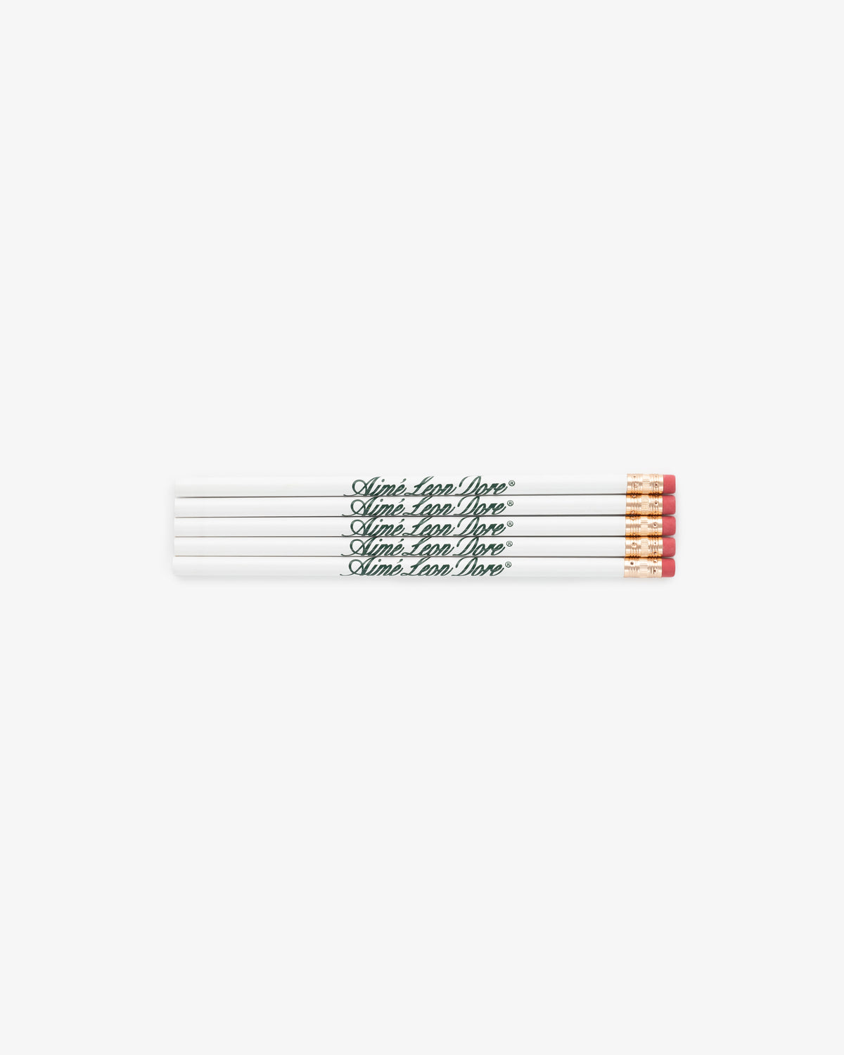 Four white pencils with pink erasers, labeled Aimé Leon Dore, from the Pencil 5 Pack, arranged side by side.